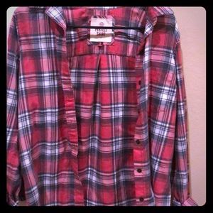 A red and grey flannel 🦊